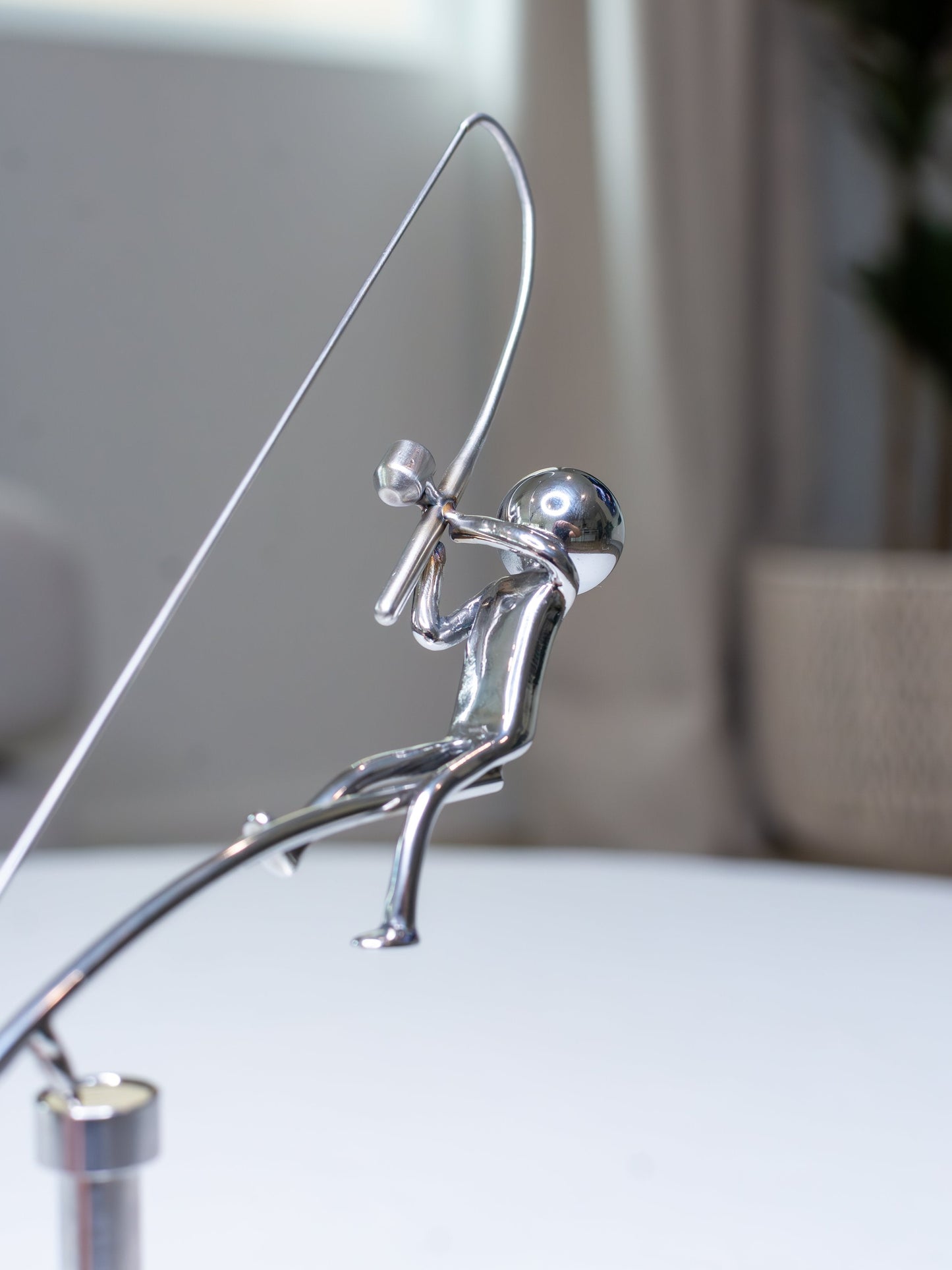 🎣Skulpturen "Fiskaren balanserar"
