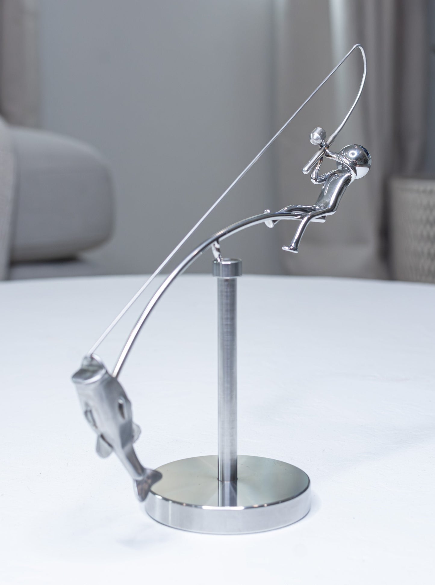 🎣Skulpturen "Fiskaren balanserar"